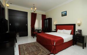 Katil atau katil-katil dalam bilik di Remas Hotel Suites - Al Khoudh, Seeb, Muscat