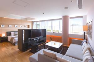 TV a/nebo společenská místnost v ubytování Hotel Arc Riche Toyohashi