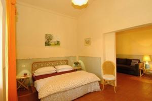 Postel nebo postele na pokoji v ubytování Agriturismo Montecchio