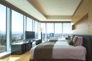 Postel nebo postele na pokoji v ubytování Hotel Arc Riche Toyohashi