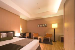 Postel nebo postele na pokoji v ubytování Hotel Arc Riche Toyohashi
