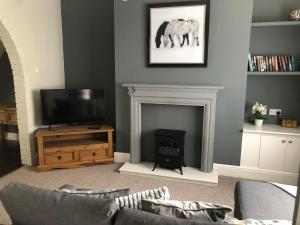 A television and/or entertainment centre at 34 Brunton Street Serviced Accommodation
