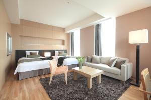 Postel nebo postele na pokoji v ubytování Hotel Arc Riche Toyohashi