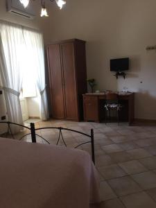 Postel nebo postele na pokoji v ubytování Agriturismo da Regina