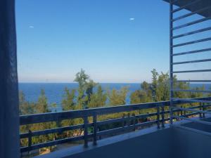 a view of the ocean from the balcony of a house at Phu Cuong Beach Hotel in Dong Hoi