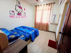 Cama ou camas em um quarto em River View - Dhuha Homestay