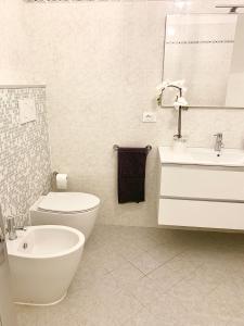 A bathroom at Indipendenza Luxury Apartments