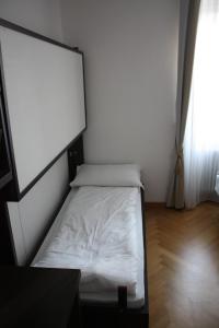 Postel nebo postele na pokoji v ubytování Garnì Villa Waiz