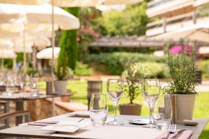 สวนหย่อมนอก The Originals Boutique, Hôtel Les Strélitzias
