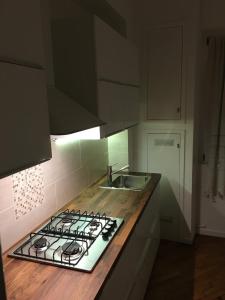 A kitchen or kitchenette at New Capolinea 5 - Apartment