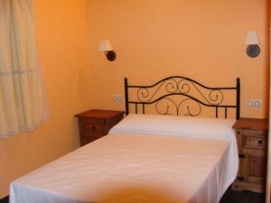Postel nebo postele na pokoji v ubytování Casas Rurales Manolo
