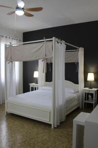 Cama o camas de una habitación en B&B Il Ponticello