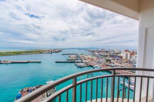 a view of a river from a balcony at Hotel East China Sea in Ishigaki Island