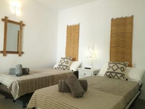 En eller flere senge i et værelse på Casita Bonita Old Town Marbella