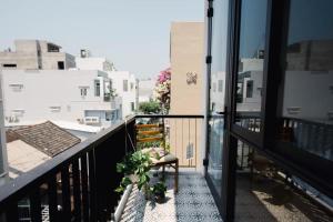 Un balcón o terraza de Carol Homestay Da Nang Beach 2