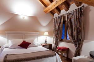 Postel nebo postele na pokoji v ubytování Villa Russell Hotel&Apartments