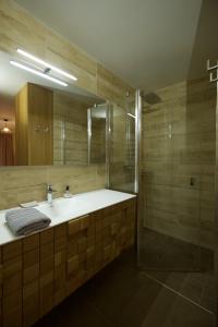 Phòng tắm tại L'Eyssaben Appartement de grand standing à Serre-Chevalier