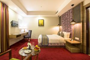 Voodi või voodid majutusasutuse Hotel Siddhartha, Nepalgunj toas