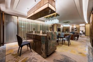 Posezení v ubytování Auto City Ruili Hotel