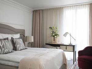 Postel nebo postele na pokoji v ubytování Britannia Hotel