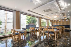 Restaurant ou autre lieu de restauration dans l'établissement An Dương Hotel & Apartment