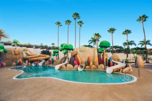 a water park in a resort with a water slide at Iberostar Bouganville Playa in Adeje