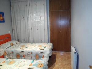 Posteľ alebo postele v izbe v ubytovaní RELAX, MAR Y MONTAÑA