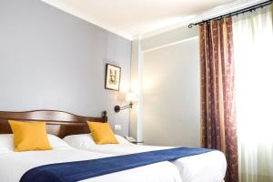 Cama o camas de una habitación en Villa Soledad