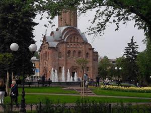 a building with a water fountain in front of it at Апартаменты в центре in Chernihiv