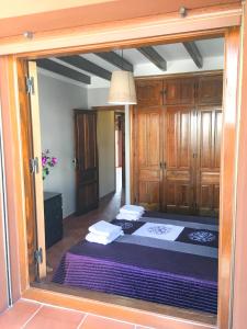 Postel nebo postele na pokoji v ubytování Casa de Teones
