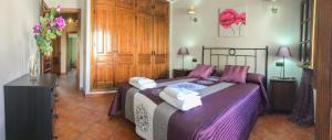 Postel nebo postele na pokoji v ubytování Casa de Teones + 37 fotografií