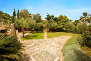 Vonkajšia záhrada v ubytovaní Villa Callistemon