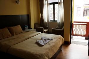 Ένα ή περισσότερα κρεβάτια σε δωμάτιο στο Hotel Yala Peak