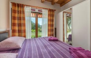 Postel nebo postele na pokoji v ubytování Holiday House Antonio