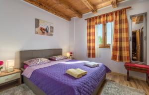 Postel nebo postele na pokoji v ubytování Holiday House Antonio