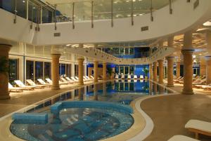 a large swimming pool on a cruise ship at Splendid Conference & Spa Resort in Budva