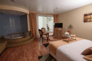 Postel nebo postele na pokoji v ubytování Hotel del Valle Azapa