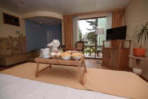 TV a/nebo společenská místnost v ubytování Hotel del Valle Azapa