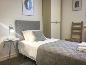 Postel nebo postele na pokoji v ubytování Rotzowlund BnB