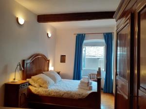 Łóżko lub łóżka w pokoju w obiekcie Attico sul Fiume