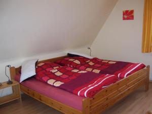 Postel nebo postele na pokoji v ubytování Haus am Roseneck