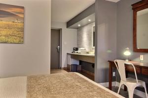 Postel nebo postele na pokoji v ubytování Hotel Motel Le Quiet