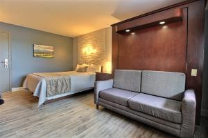 Posezení v ubytování Hotel Motel Le Quiet