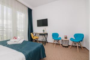 Posteľ alebo postele v izbe v ubytovaní Varsovia Comfort