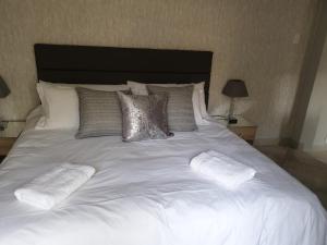 Katil atau katil-katil dalam bilik di Elephant Bush Guest Cottage
