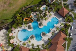an overhead view of a pool at a resort at 5356 Water Park Solterra Resort 5bed house - 10 minutes from Disney in Davenport