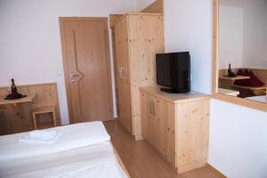A bed or beds in a room at Appartements Spitaler