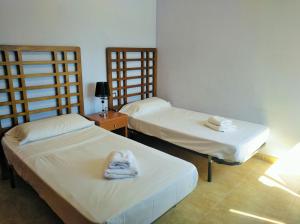 Cama ou camas em um quarto em Villa Soleil