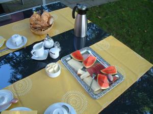 a table with a tray of food on a table at Haus am Trielberg in Meersburg