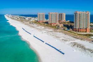 an aerial view of the beach and buildings at Portofino Island Resort in Pensacola Beach